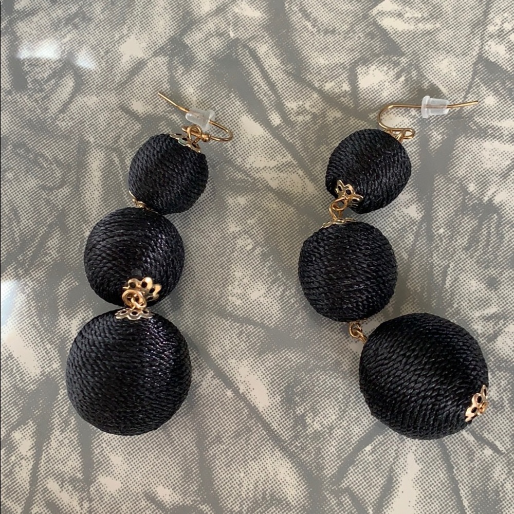 Black statement earrings